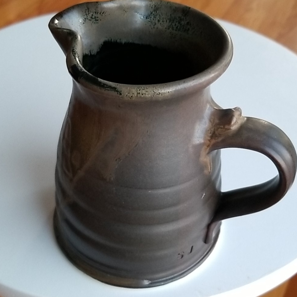 S.J  Pottery signed Brown Heart Pitcher